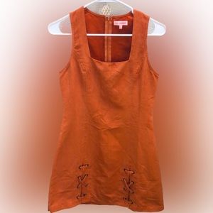 Burnt orange suede dress with lace up detail